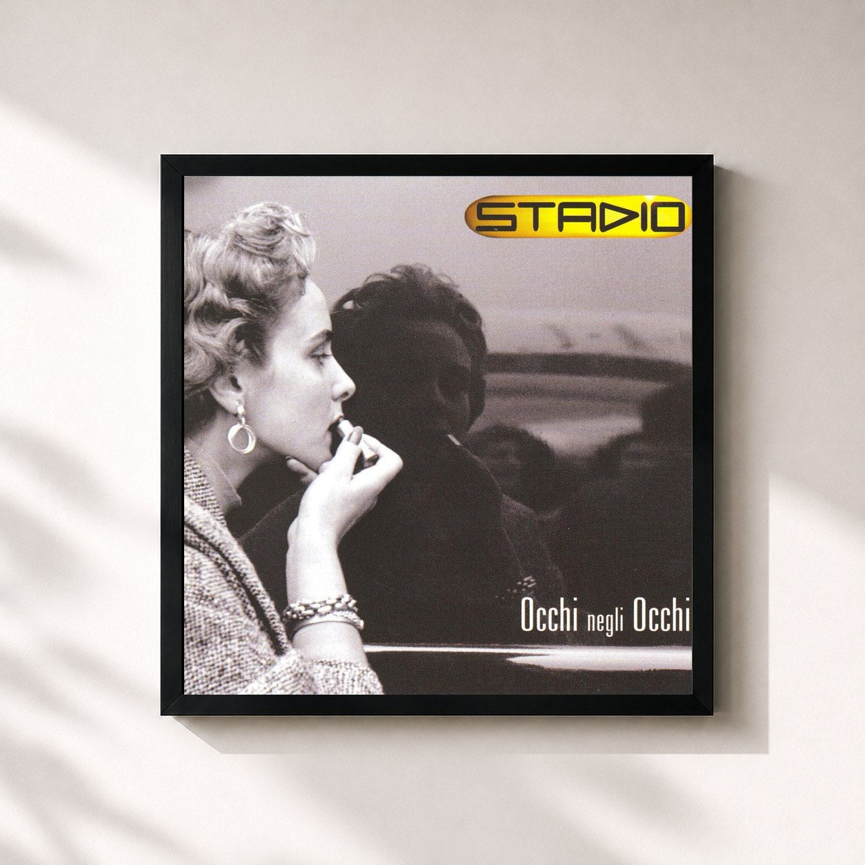 #noir Tableau carré de l'album Occhi Negli Occhi de Stadio, cadre noir 32x32 cm