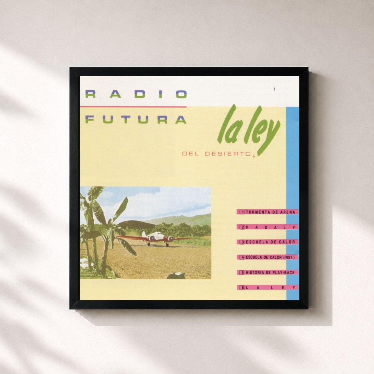 #noir Tableau carré de l'album La Ley Del Desierto de Radio Futura, cadre noir 32x32 cm