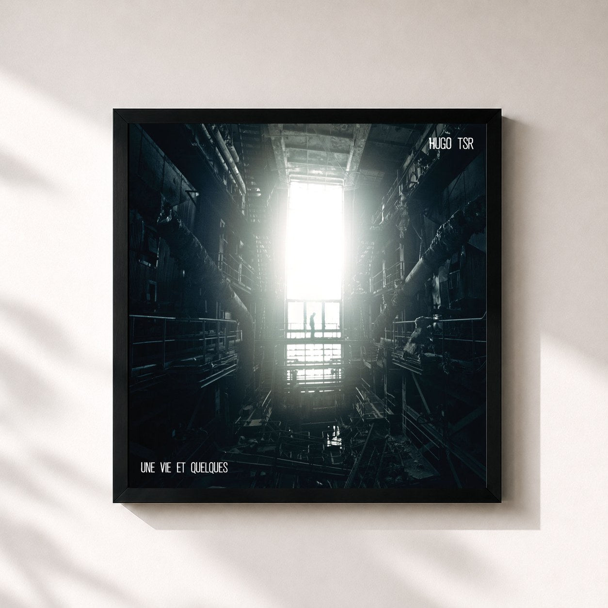 #noir Tableau carré de l'album Une vie et quelques de Hugo TSR, cadre noir 32x32 cm