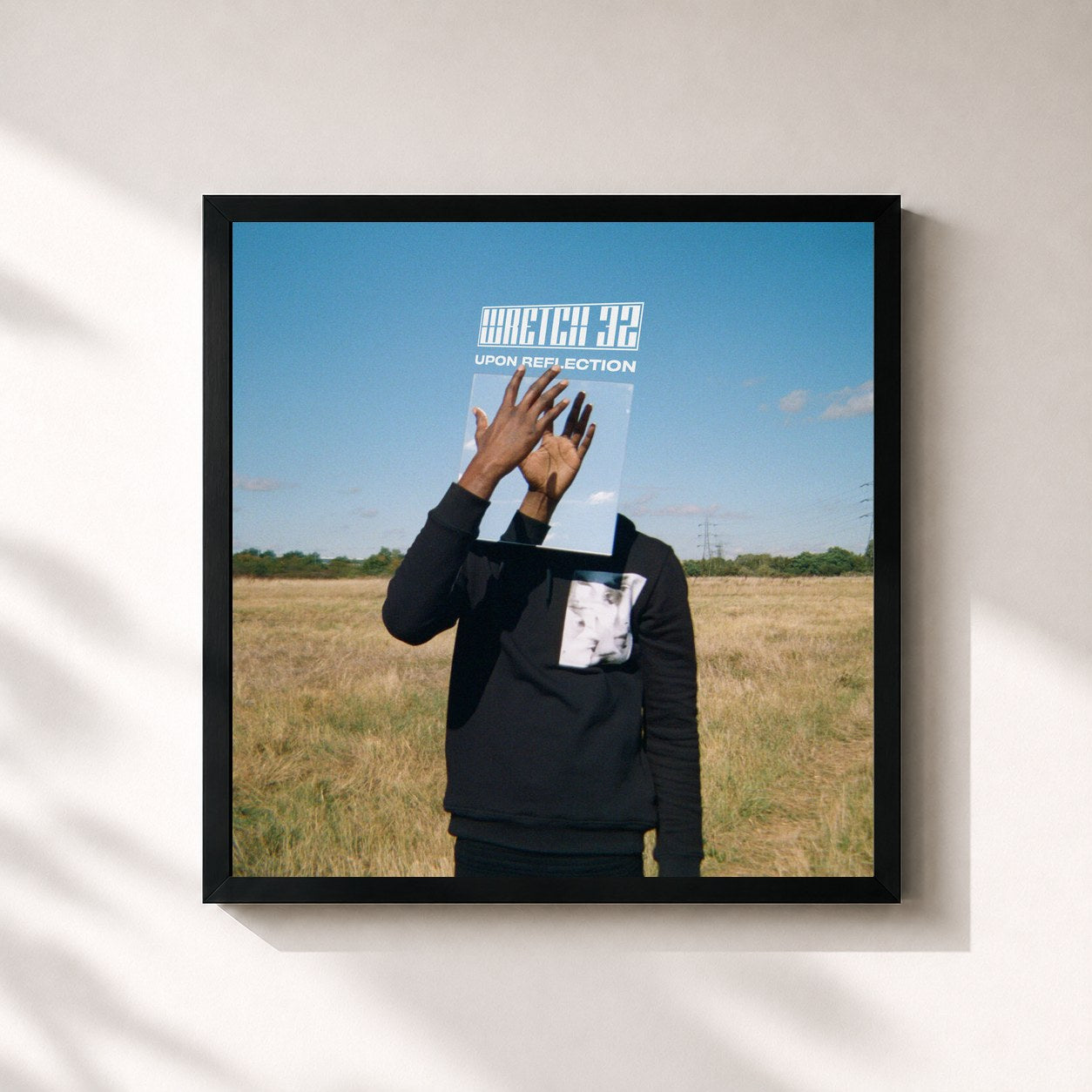 #noir Tableau carré de l'album Upon Reflection de Wretch 32, cadre noir 32x32 cm