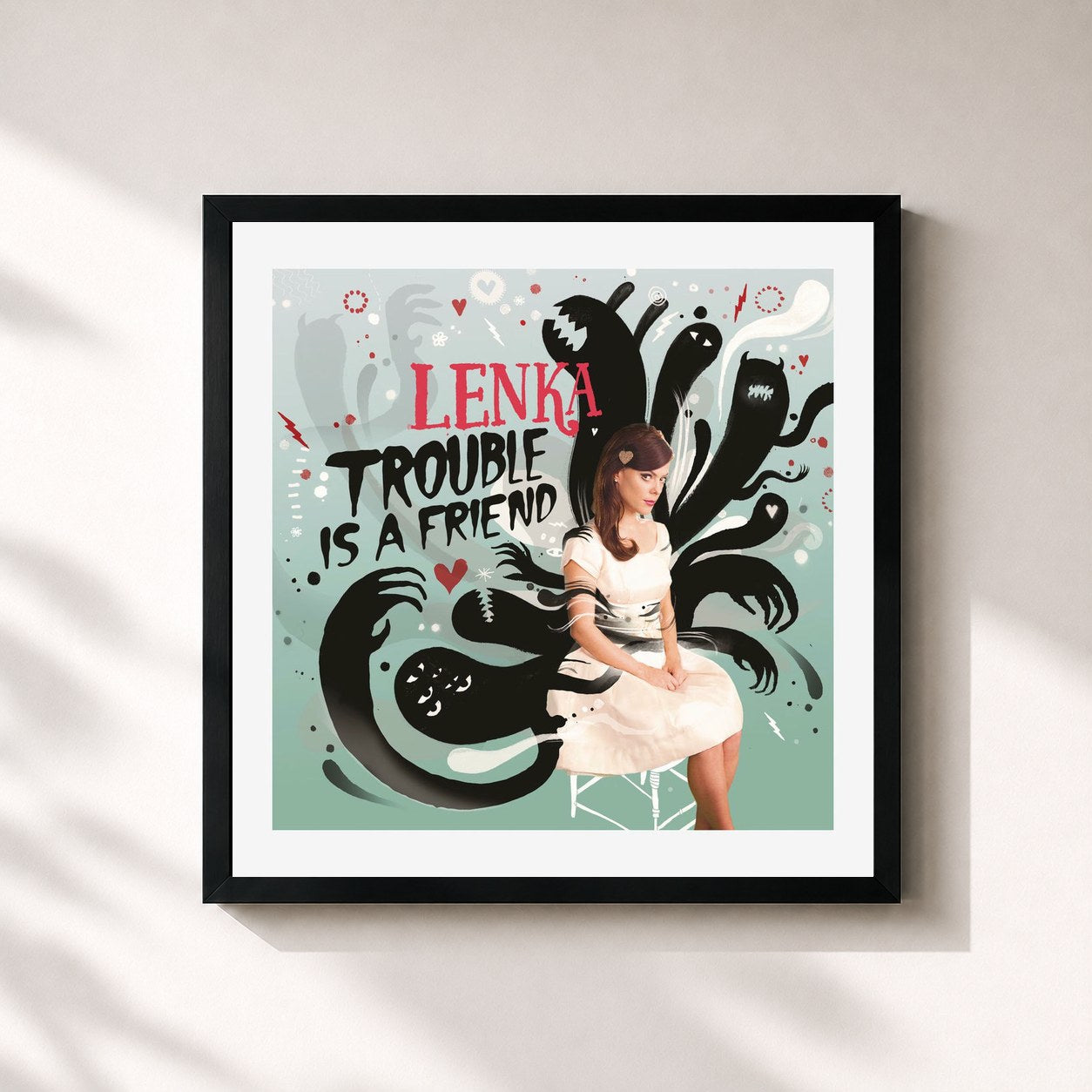 #noir Tableau carré de l'album Trouble Is A Friend - The Remixes de Lenka, cadre noir 32x32 cm