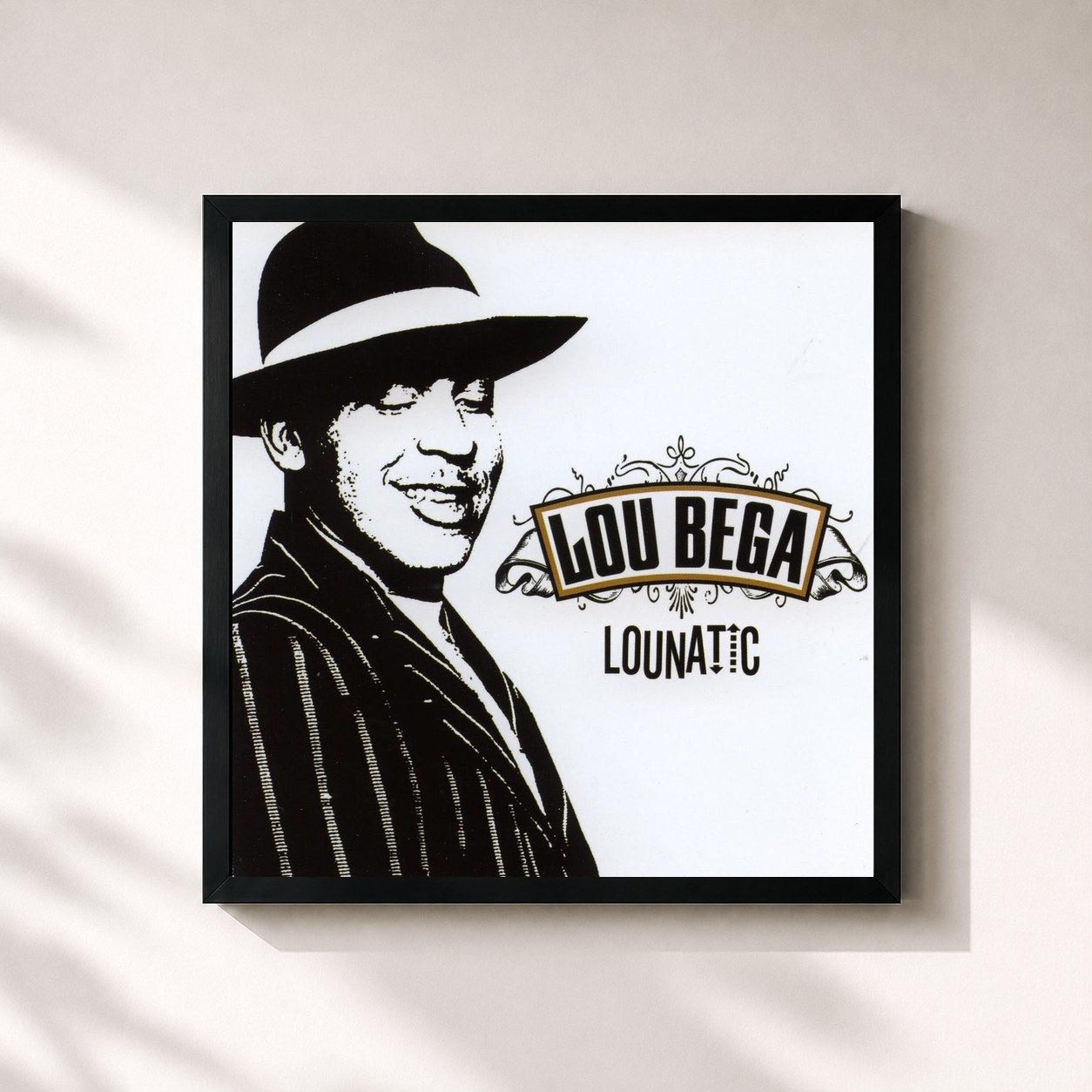 #noir Tableau carré de l'album Lounatic de Lou Bega, cadre noir 32x32 cm