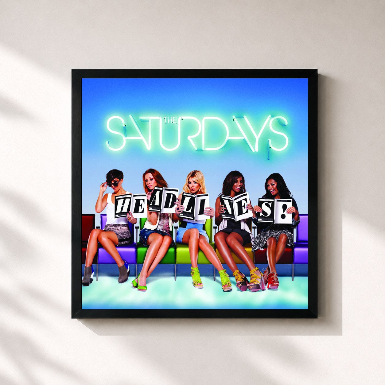 #noir Tableau carré de l'album Headlines de The Saturdays, cadre noir 32x32 cm