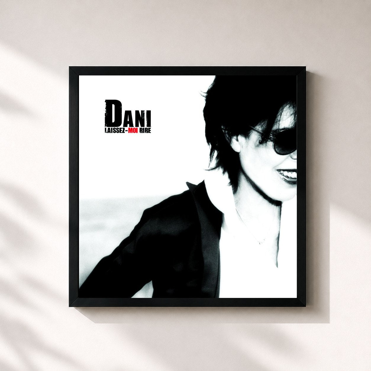 #noir Tableau carré de l'album Laissez-Moi Rire de Dani, cadre noir 32x32 cm