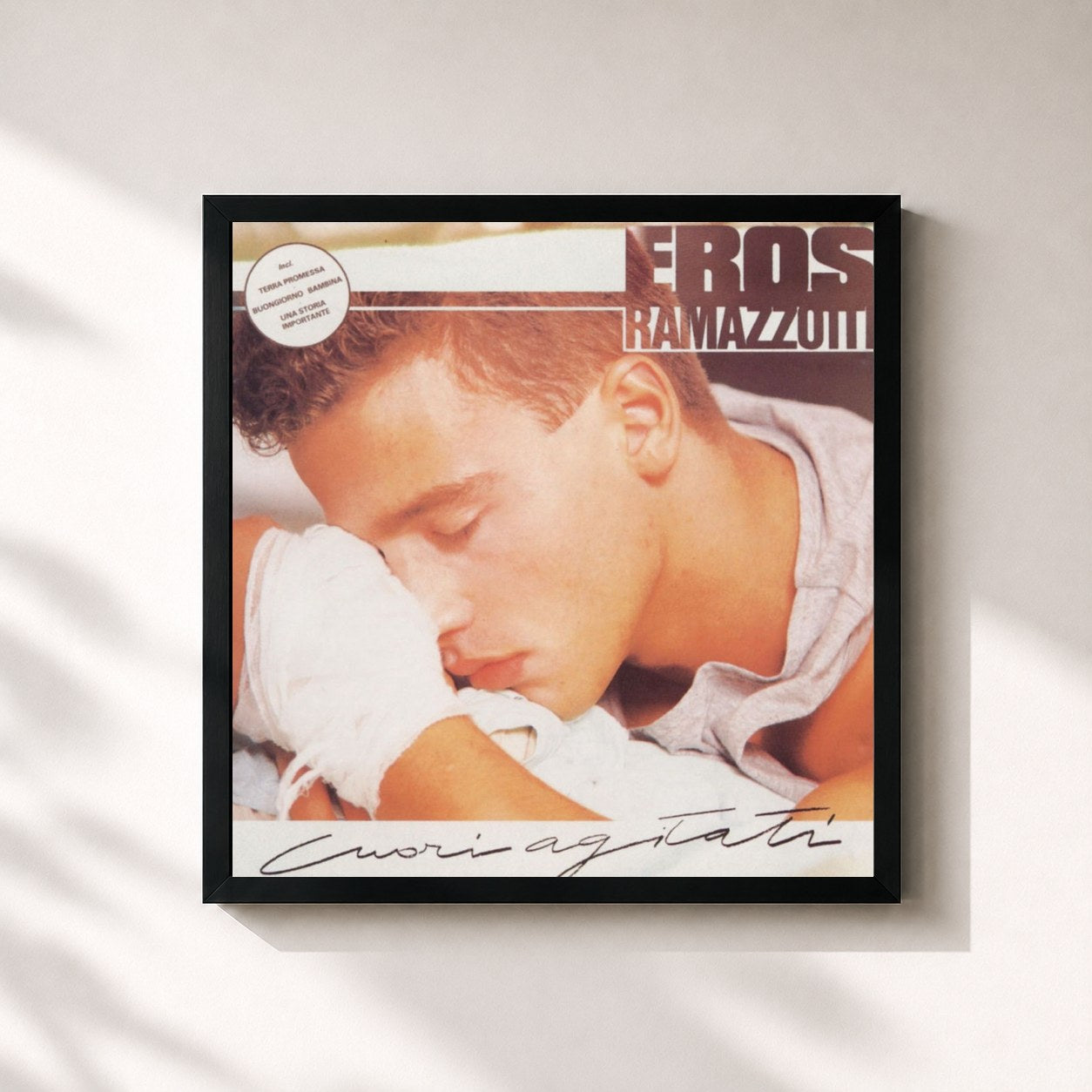 #noir Tableau carré de l'album Cuori agitati de Eros Ramazzotti, cadre noir 32x32 cm