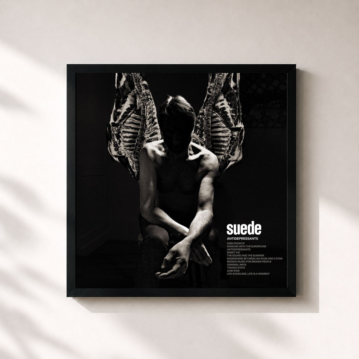 #noir Tableau carré de l'album Antidepressants de Suede, cadre noir 32x32 cm