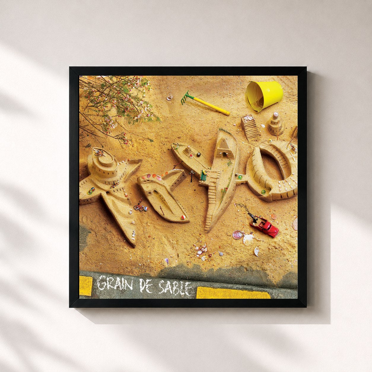 #noir Tableau carré de l'album Grain de sable de Tryo, cadre noir 32x32 cm
