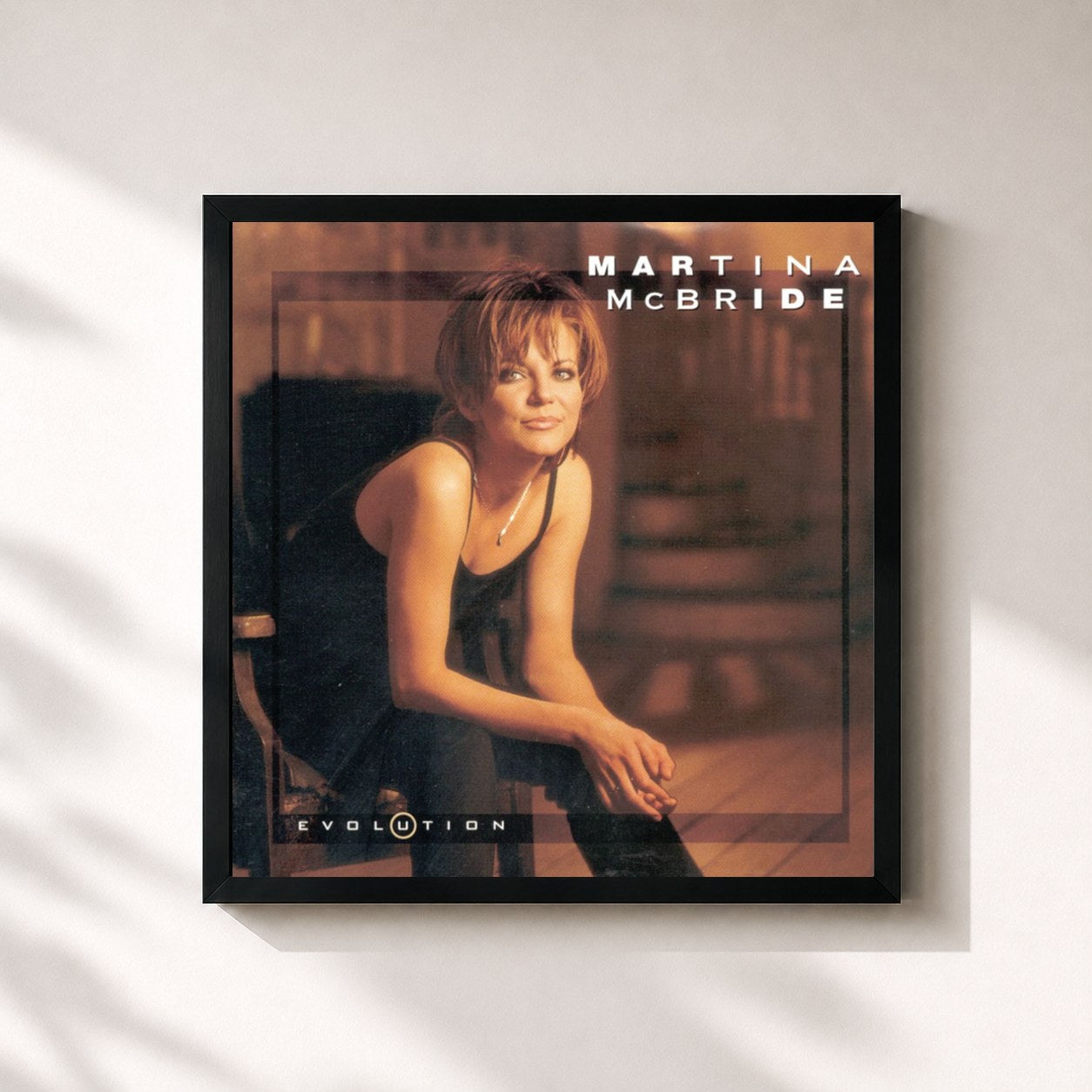 #noir Tableau carré de l'album Evolution de Martina McBride, cadre noir 32x32 cm