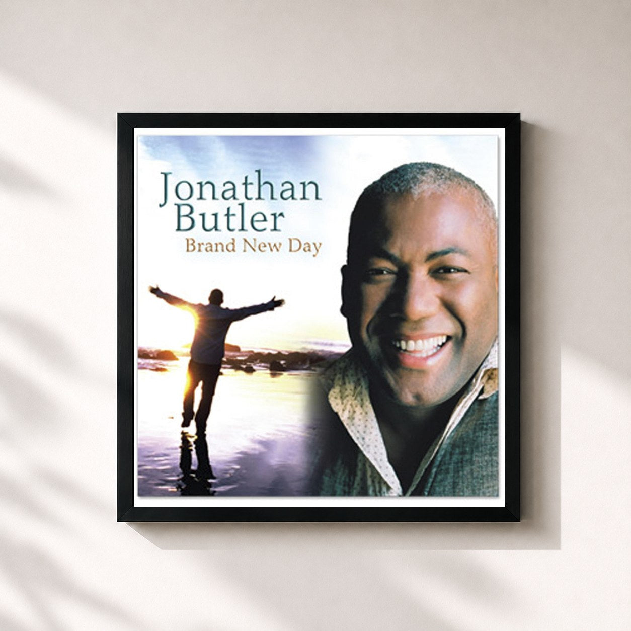 #noir Tableau carré de l'album Brand New Day de Jonathan Butler, cadre noir 32x32 cm