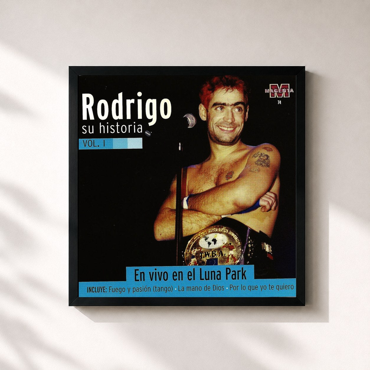 #noir Tableau carré de l'album Rodrigo en el Luna Park de Rodrigo, cadre noir 32x32 cm