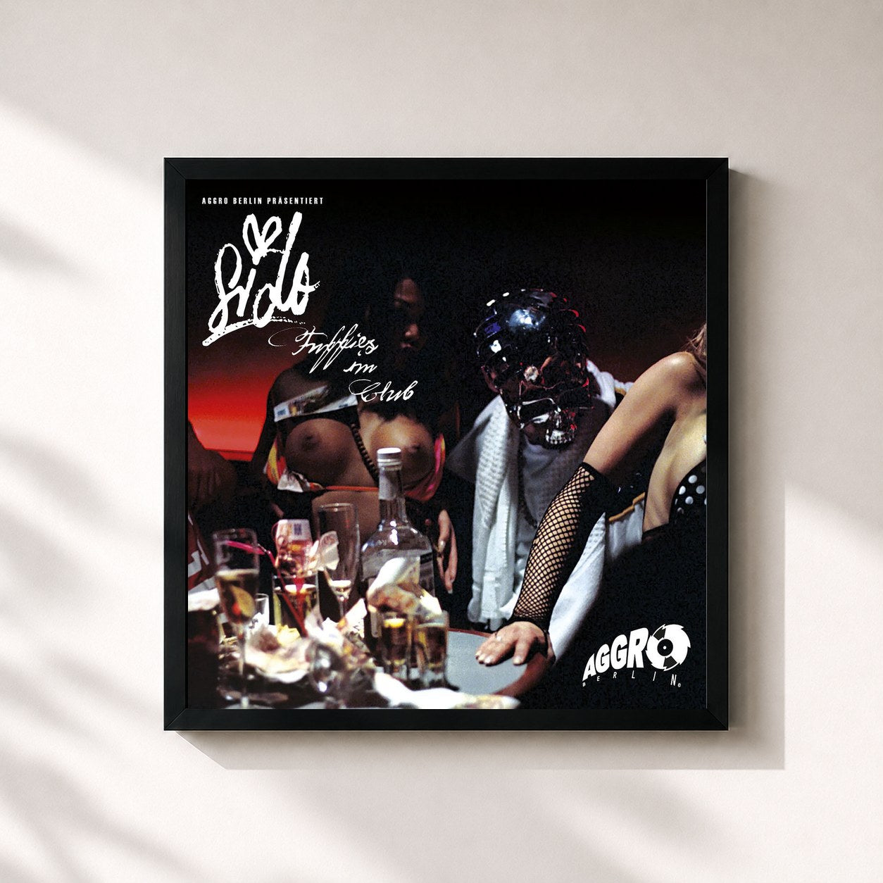 #noir Tableau carré de l'album Fuffies im Club de Sido, cadre noir 32x32 cm