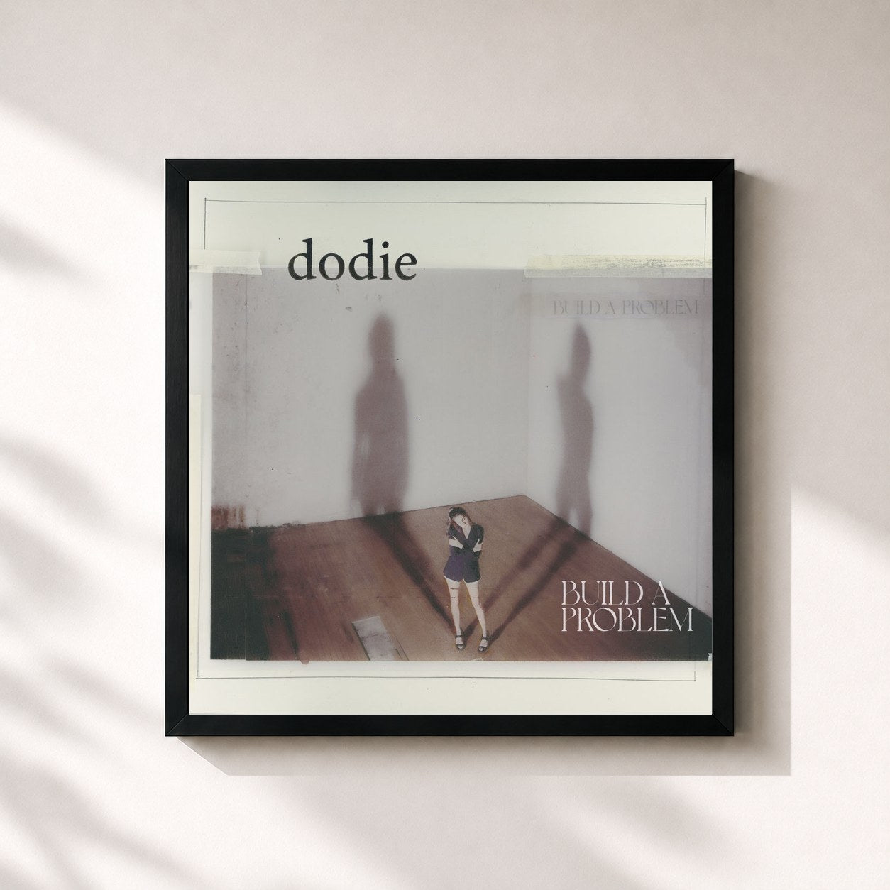 #noir Tableau carré de l'album Build A Problem de dodie, cadre noir 32x32 cm
