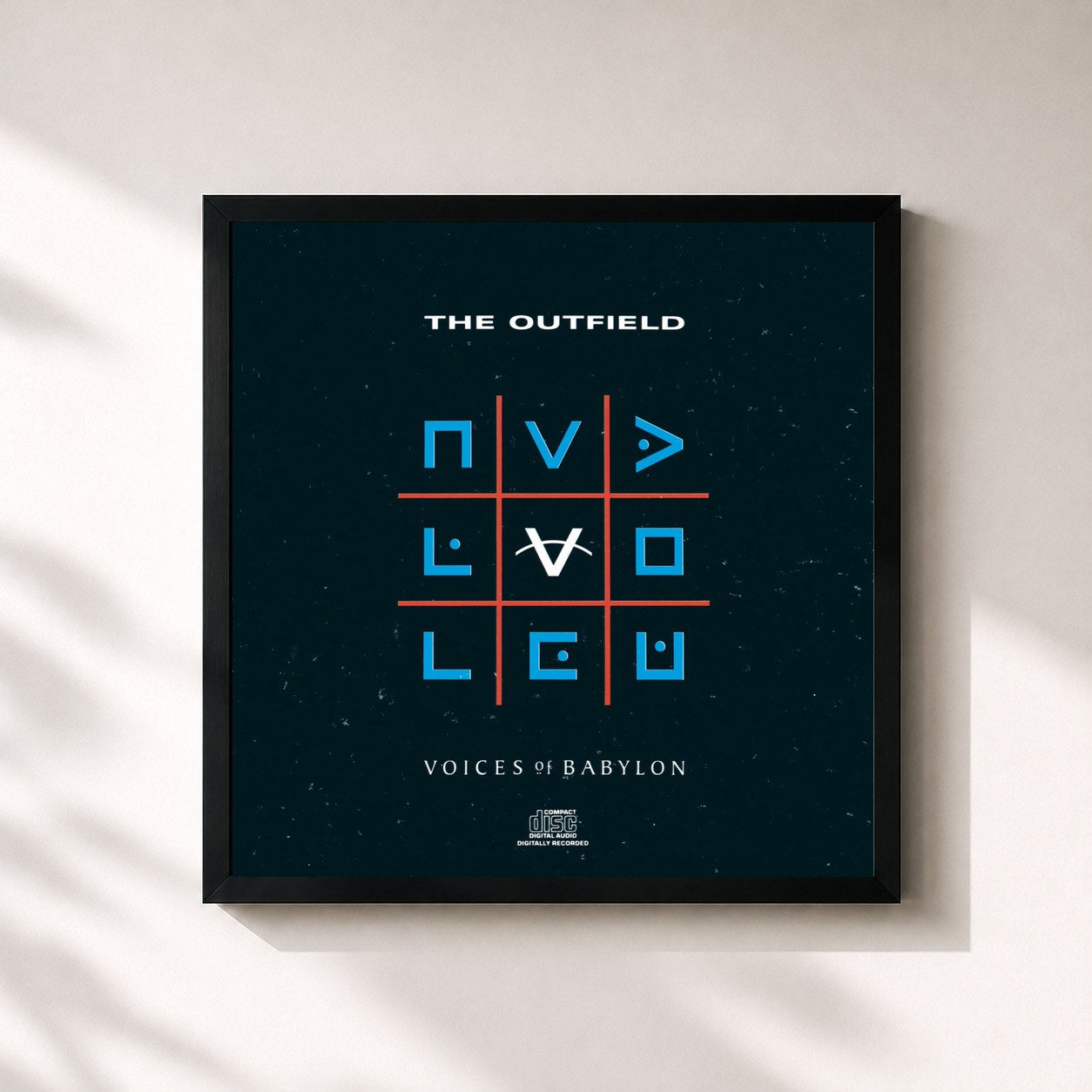 #noir Tableau carré de l'album Voices Of Babylon de The Outfield, cadre noir 32x32 cm