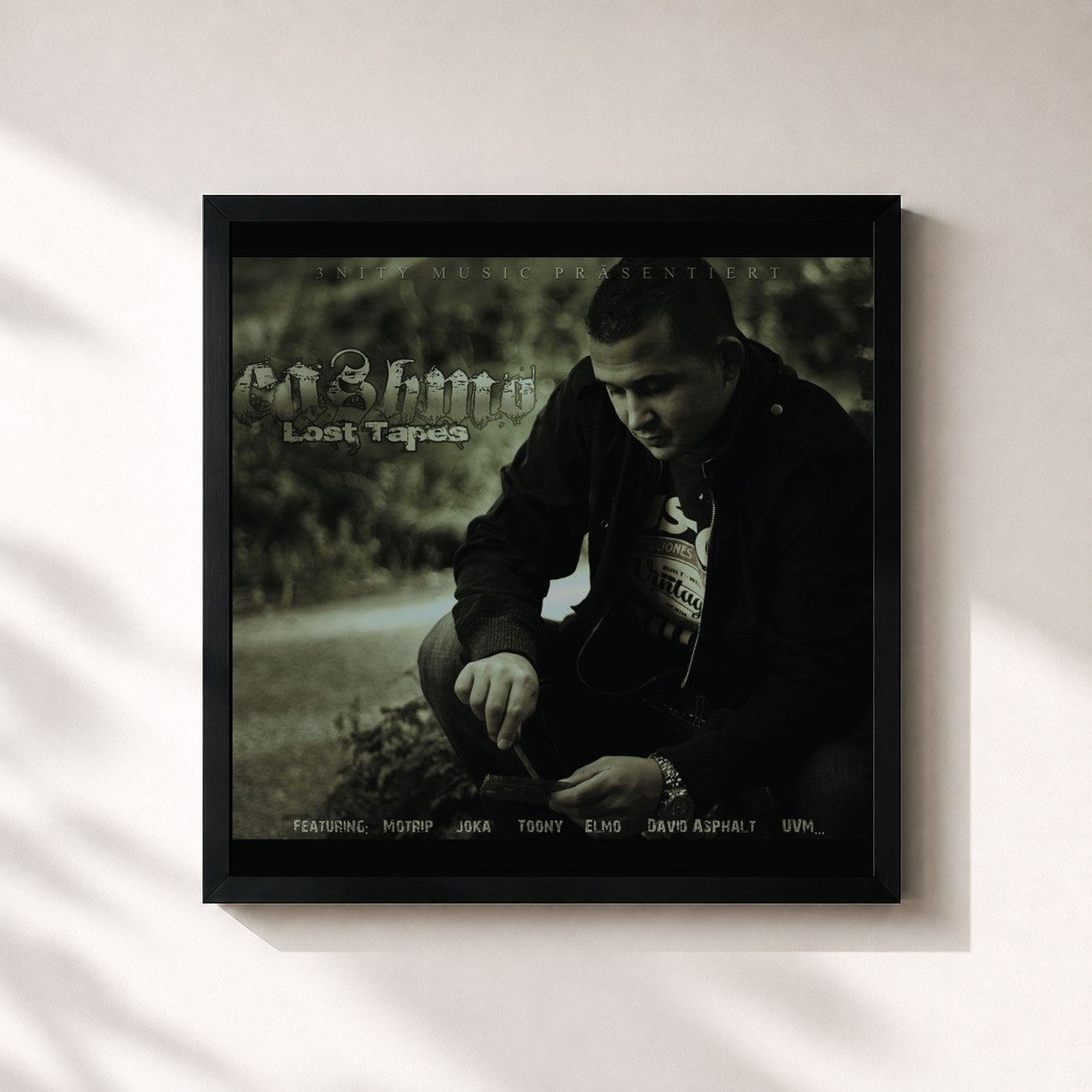 #noir Tableau carré de l'album Lost Tapes de Cashmo, cadre noir 32x32 cm