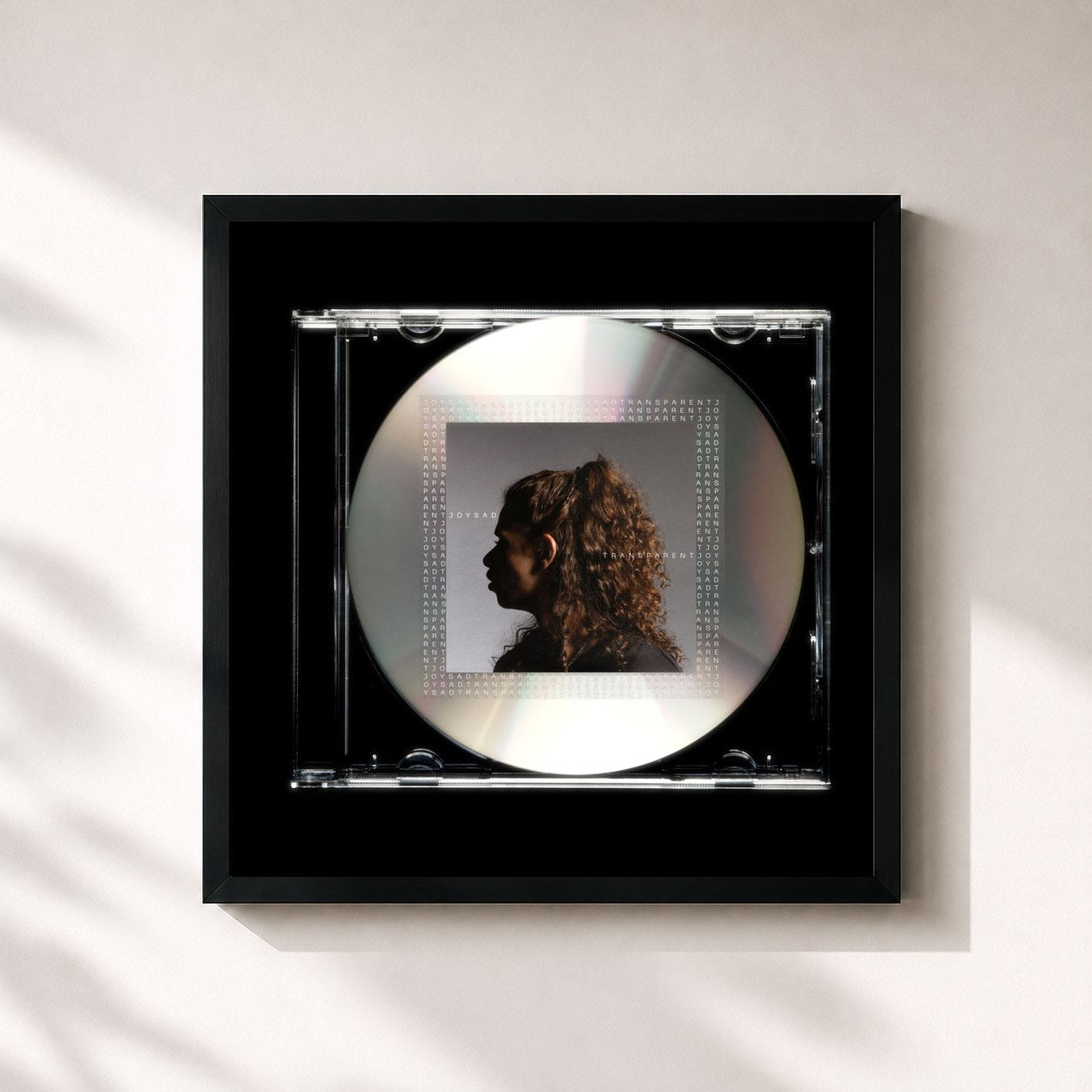 #noir Tableau carré de l'album Transparent de joysad, cadre noir 32x32 cm