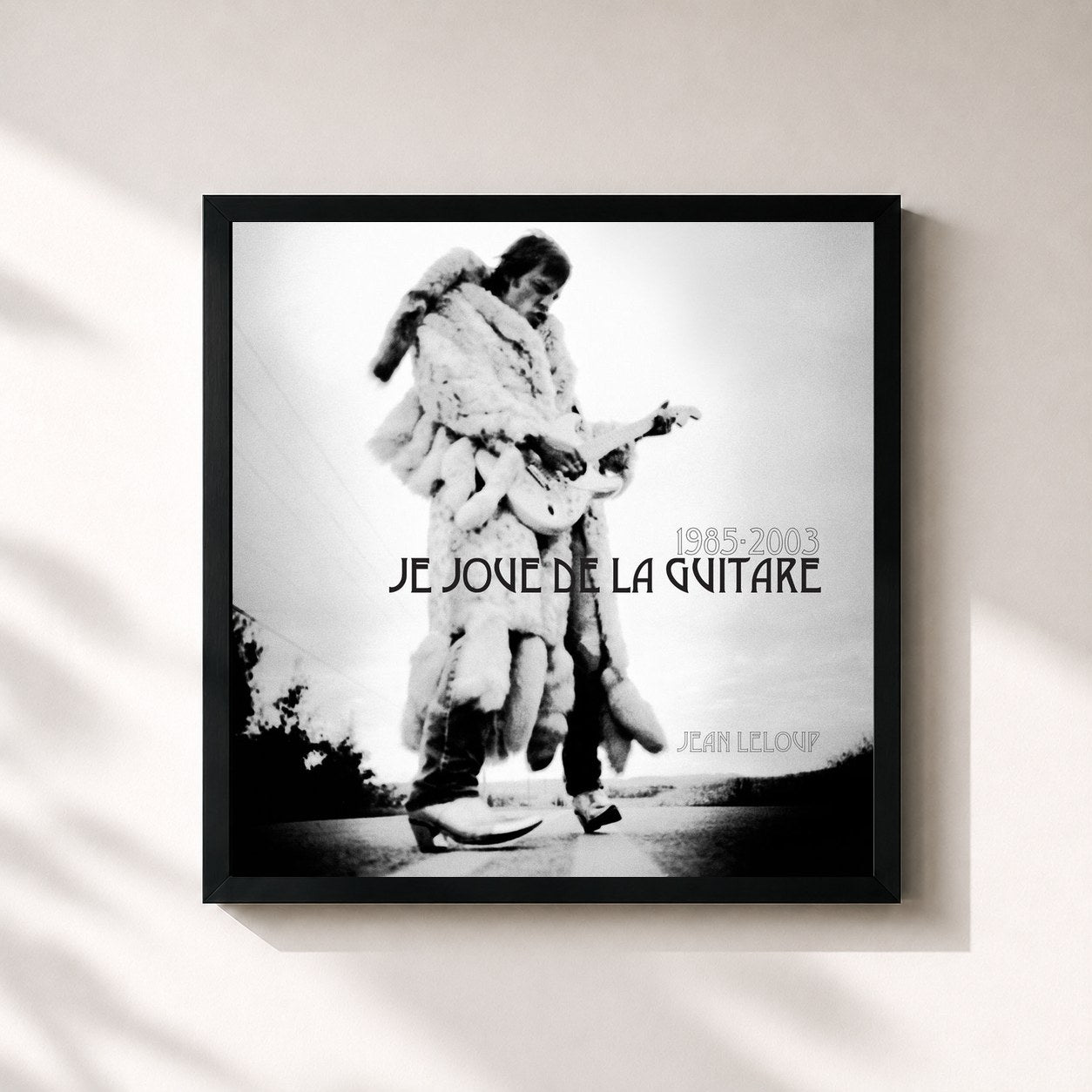 #noir Tableau carré de l'album 1985-2003 Je joue de la guitare de Jean Leloup, cadre noir 32x32 cm