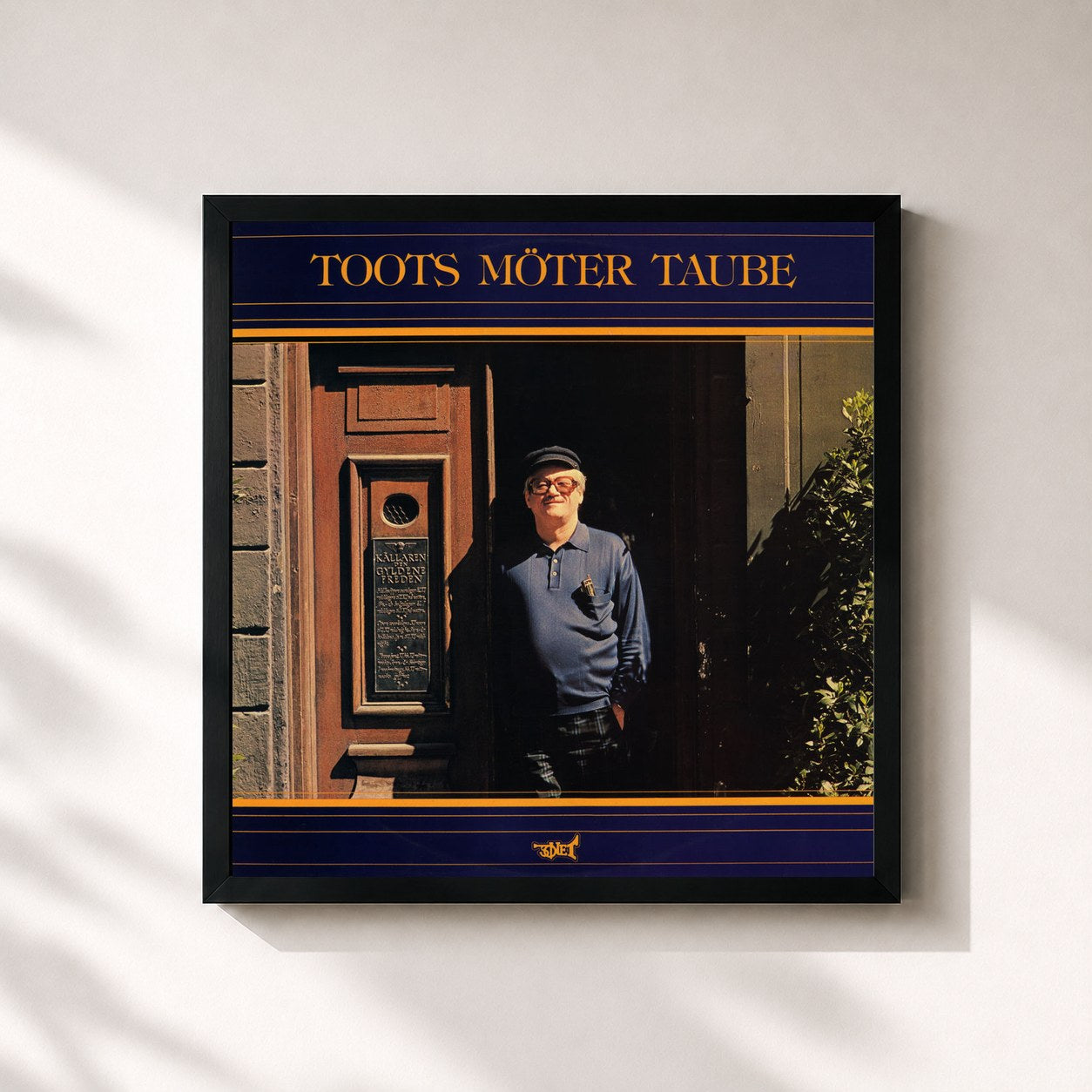 #noir Tableau carré de l'album Toots möter Taube de Toots Thielemans, cadre noir 32x32 cm