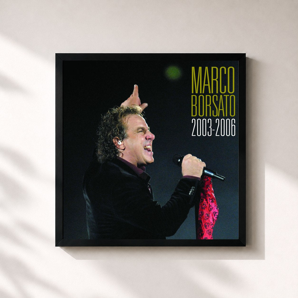 #noir Tableau carré de l'album Marco Borsato 2003 - 2006 de Marco Borsato, cadre noir 32x32 cm