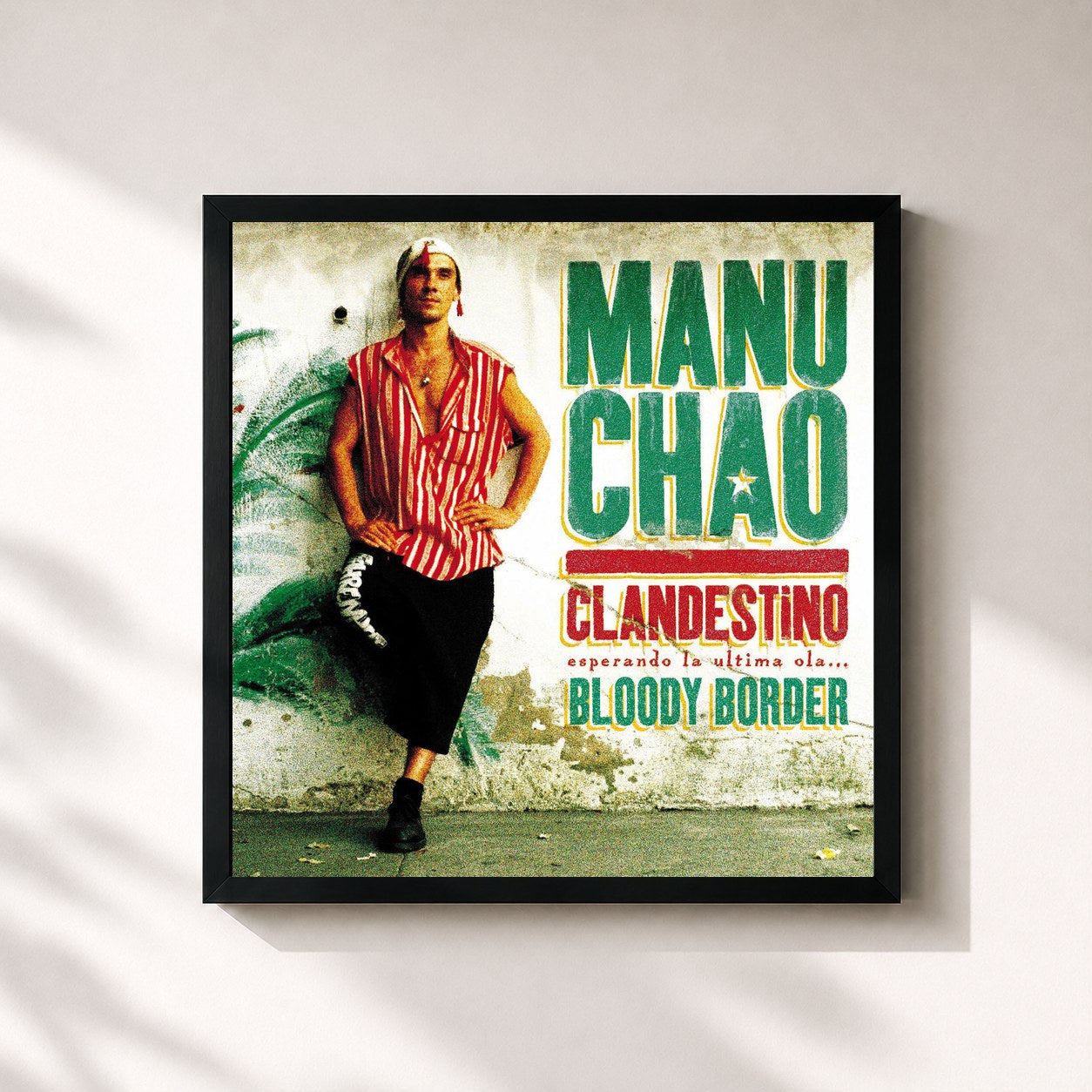 #noir Tableau carré de l'album Clandestino / Bloody Border de Manu Chao, cadre noir 32x32 cm