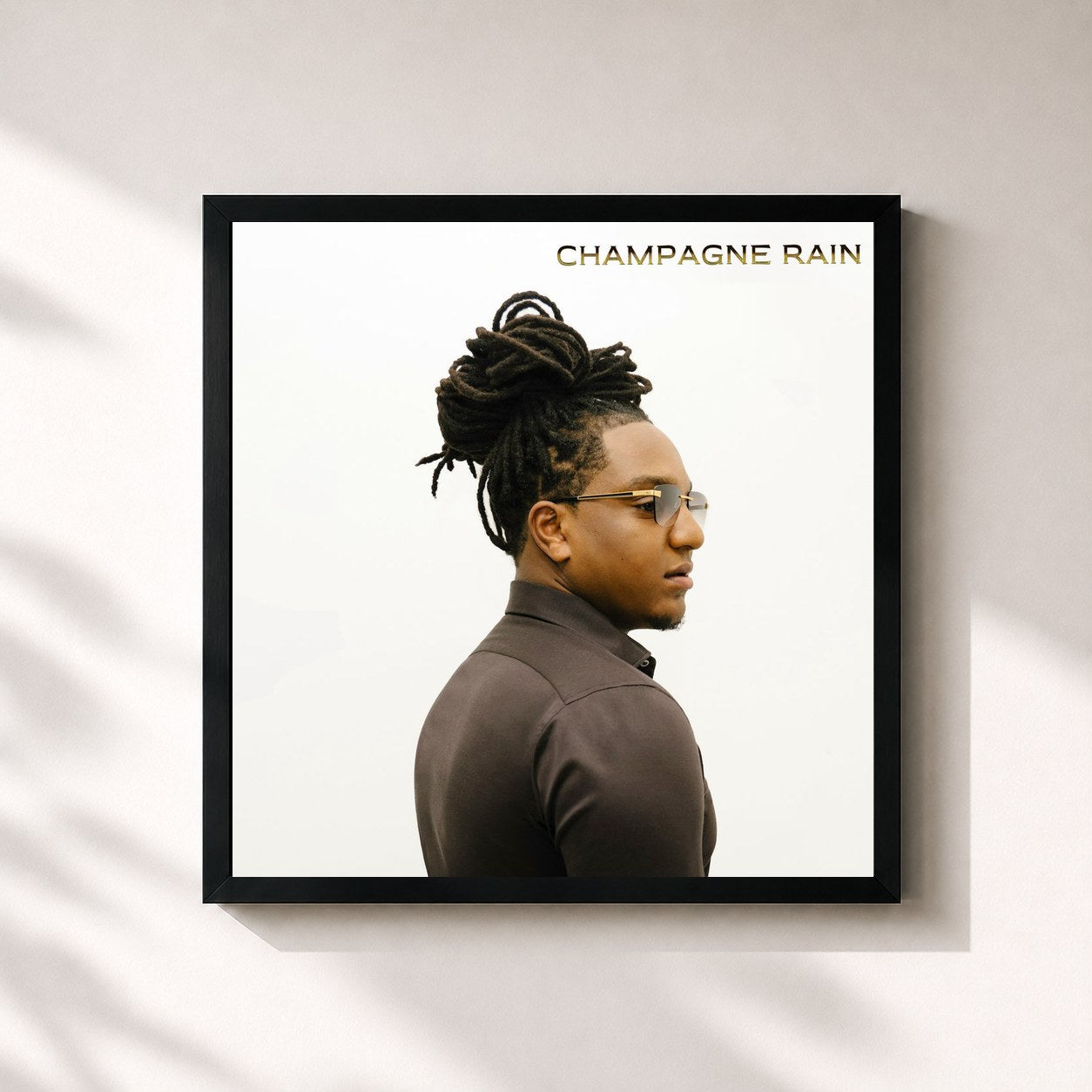 #noir Tableau carré de l'album Champagne Rain de Jonna Fraser, cadre noir 32x32 cm