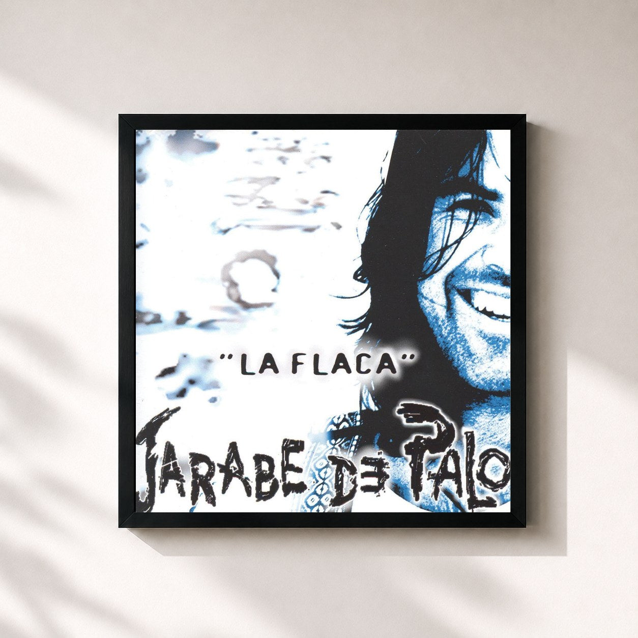 #noir Tableau carré de l'album La Flaca de Jarabe de Palo, cadre noir 32x32 cm