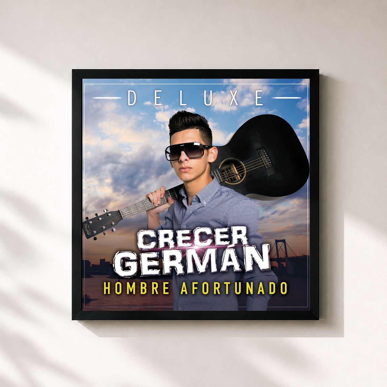 #noir Tableau carré de l'album Hombre Afortunado (Deluxe) de Crecer German, cadre noir 32x32 cm