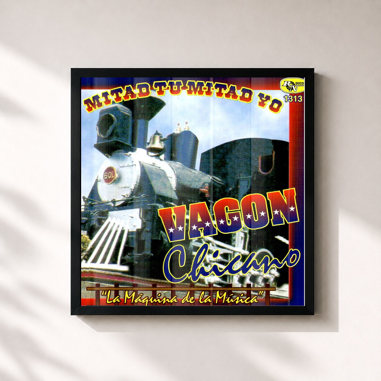 #noir Tableau carré de l'album Mitad Tu Mitad Yo de Vagon Chicano, cadre noir 32x32 cm
