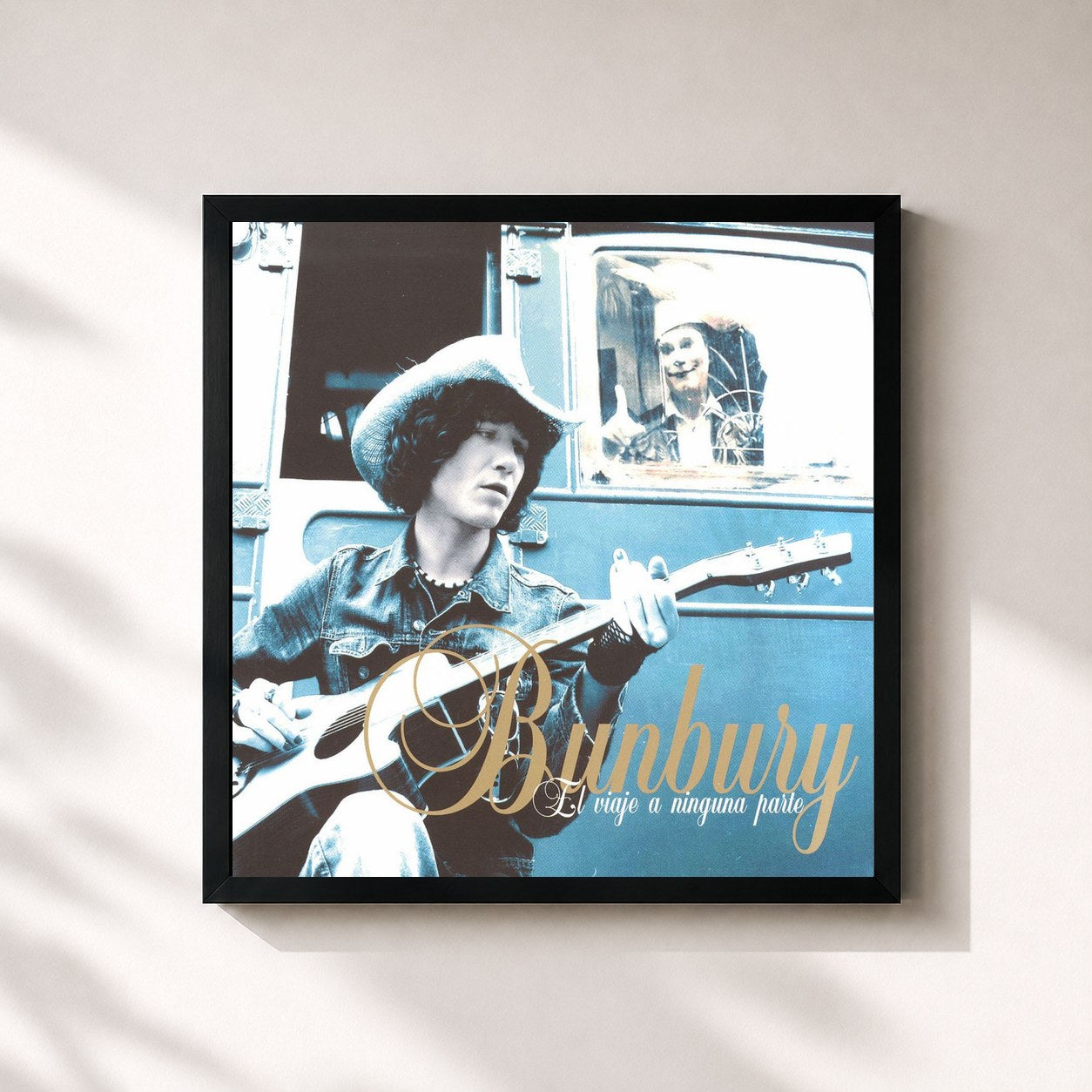#noir Tableau carré de l'album El Viaje A Ninguna Parte de Bunbury, cadre noir 32x32 cm