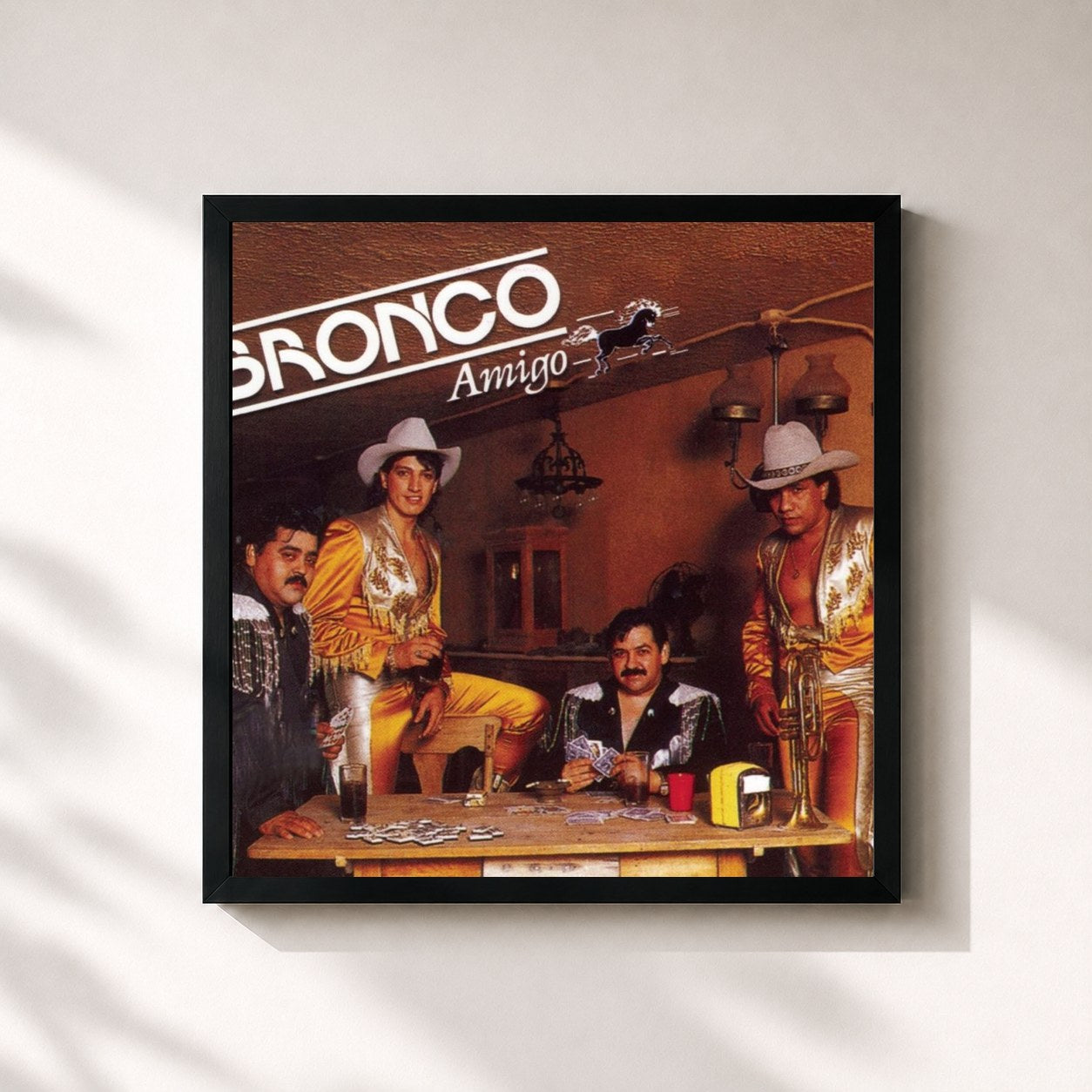 #noir Tableau carré de l'album Bronco Amigo de Bronco, cadre noir 32x32 cm