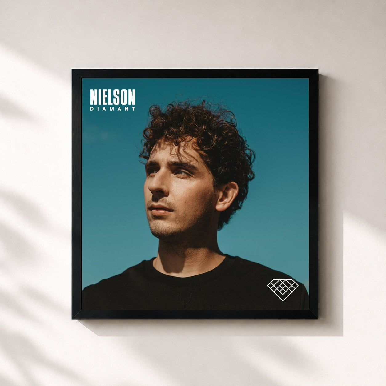 #noir Tableau carré de l'album Diamant de Nielson, cadre noir 32x32 cm