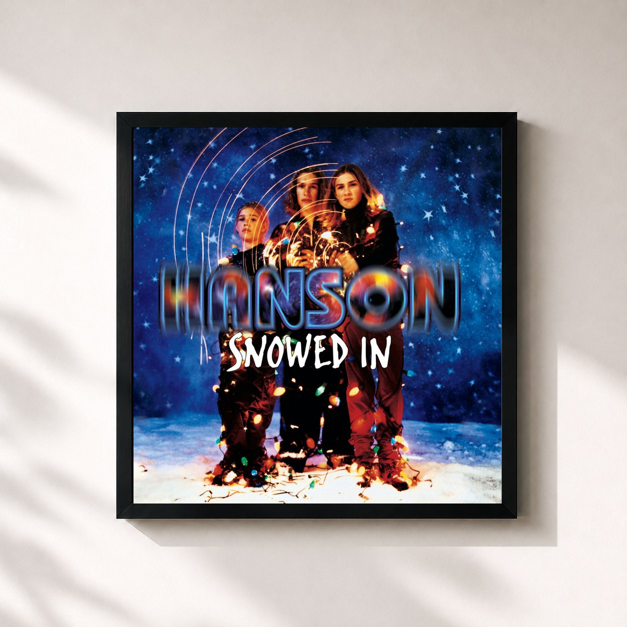#noir Tableau carré de l'album Snowed In de Hanson, cadre noir 32x32 cm