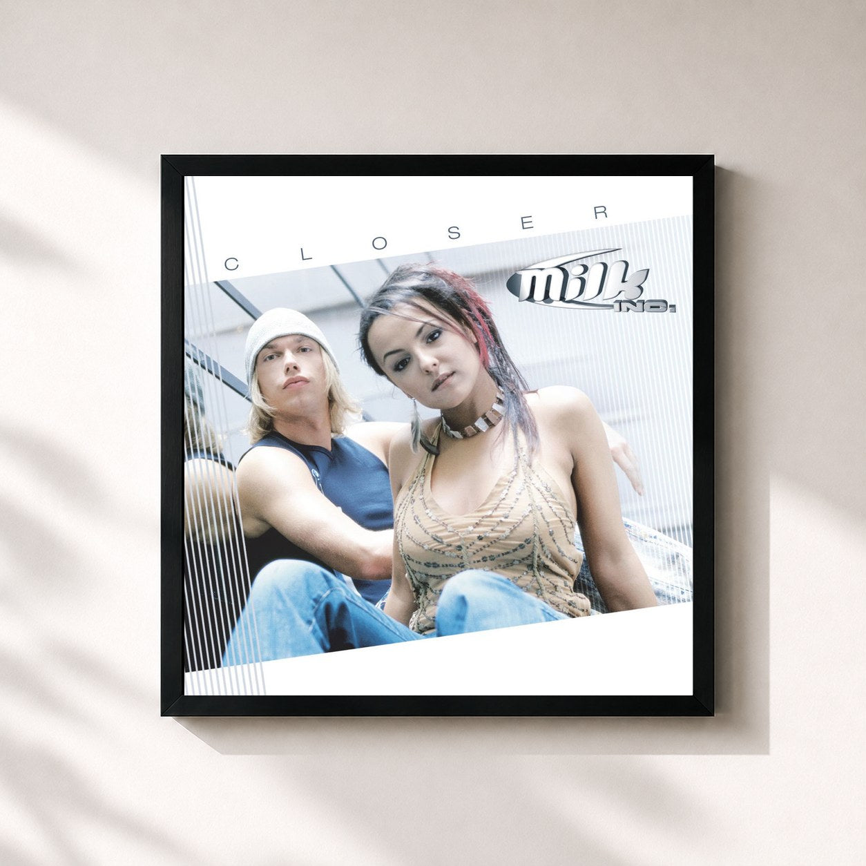 #noir Tableau carré de l'album Closer de Milk Inc., cadre noir 32x32 cm