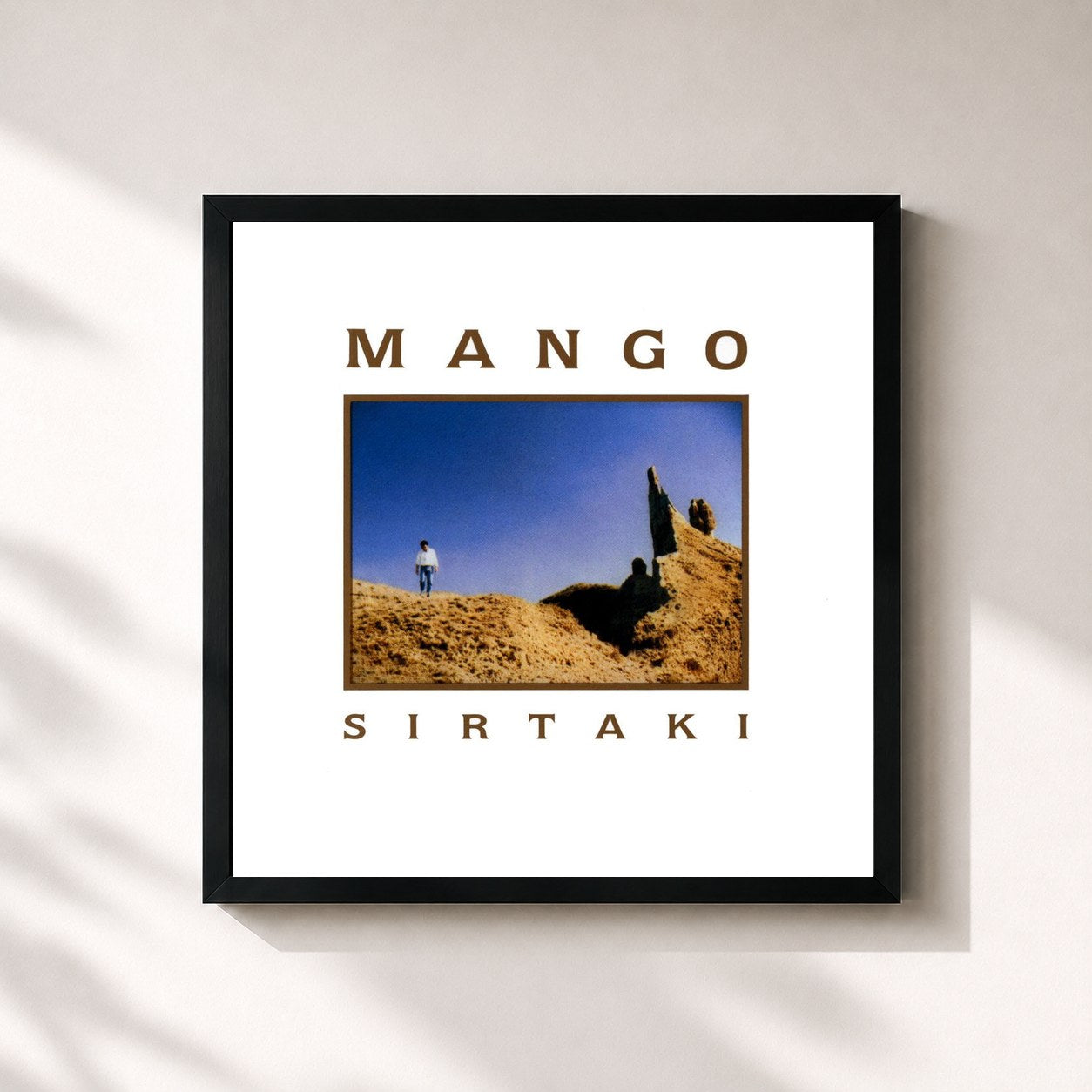 #noir Tableau carré de l'album Sirtaki de Mango, cadre noir 32x32 cm