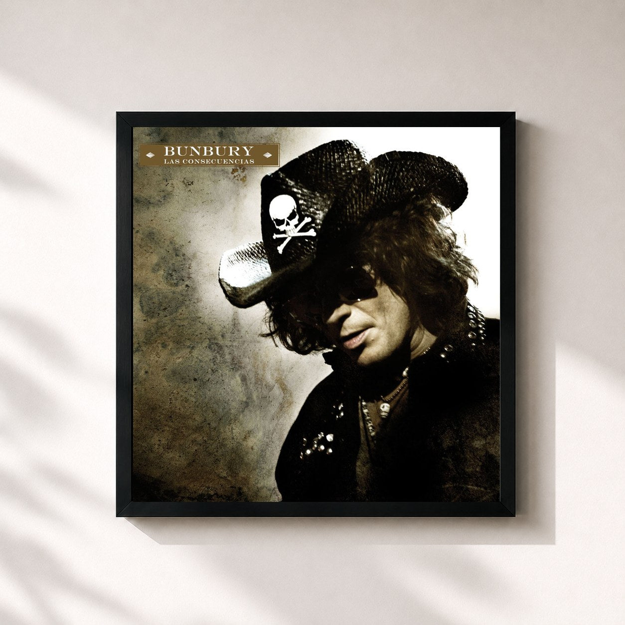 #noir Tableau carré de l'album Las Consecuencias de Bunbury, cadre noir 32x32 cm