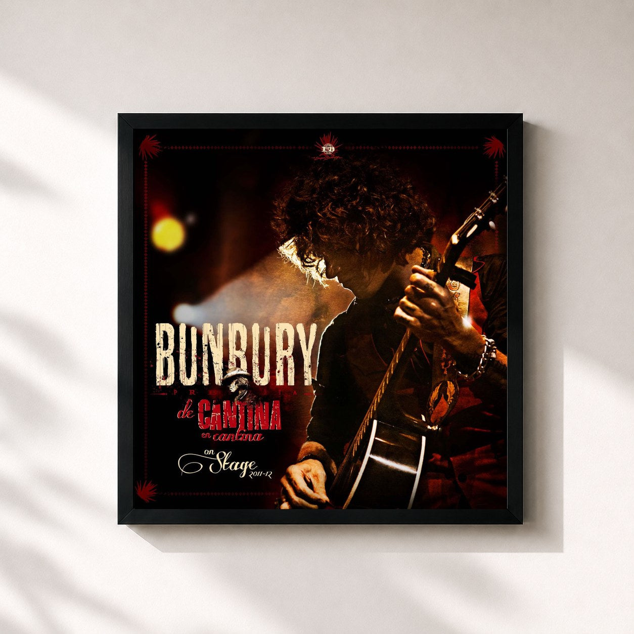 #noir Tableau carré de l'album De cantina en cantina (On Stage 2011-12) de Bunbury, cadre noir 32x32 cm