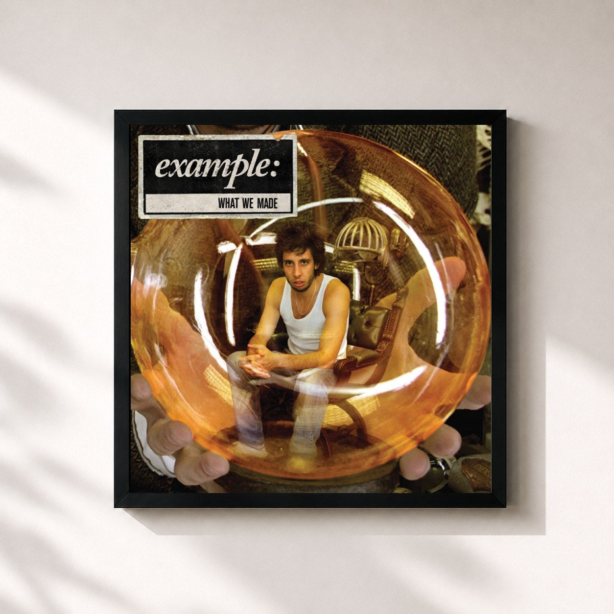 #noir Tableau carré de l'album What We Made de Example, cadre noir 32x32 cm