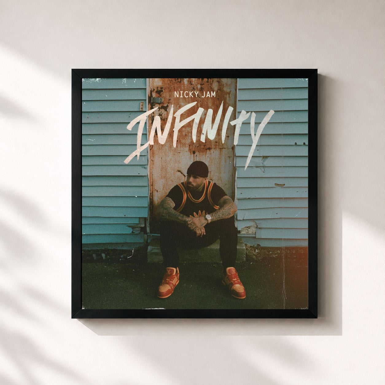 #noir Tableau carré de l'album Infinity de Nicky Jam, cadre noir 32x32 cm