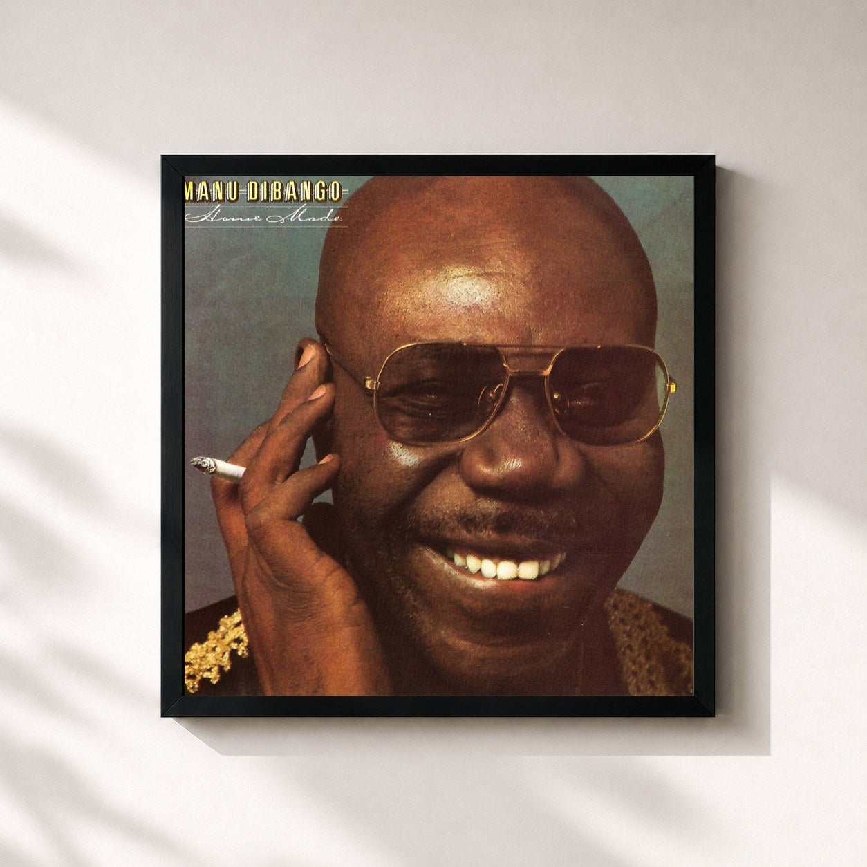 #noir Tableau carré de l'album Home Made de Manu Dibango, cadre noir 32x32 cm