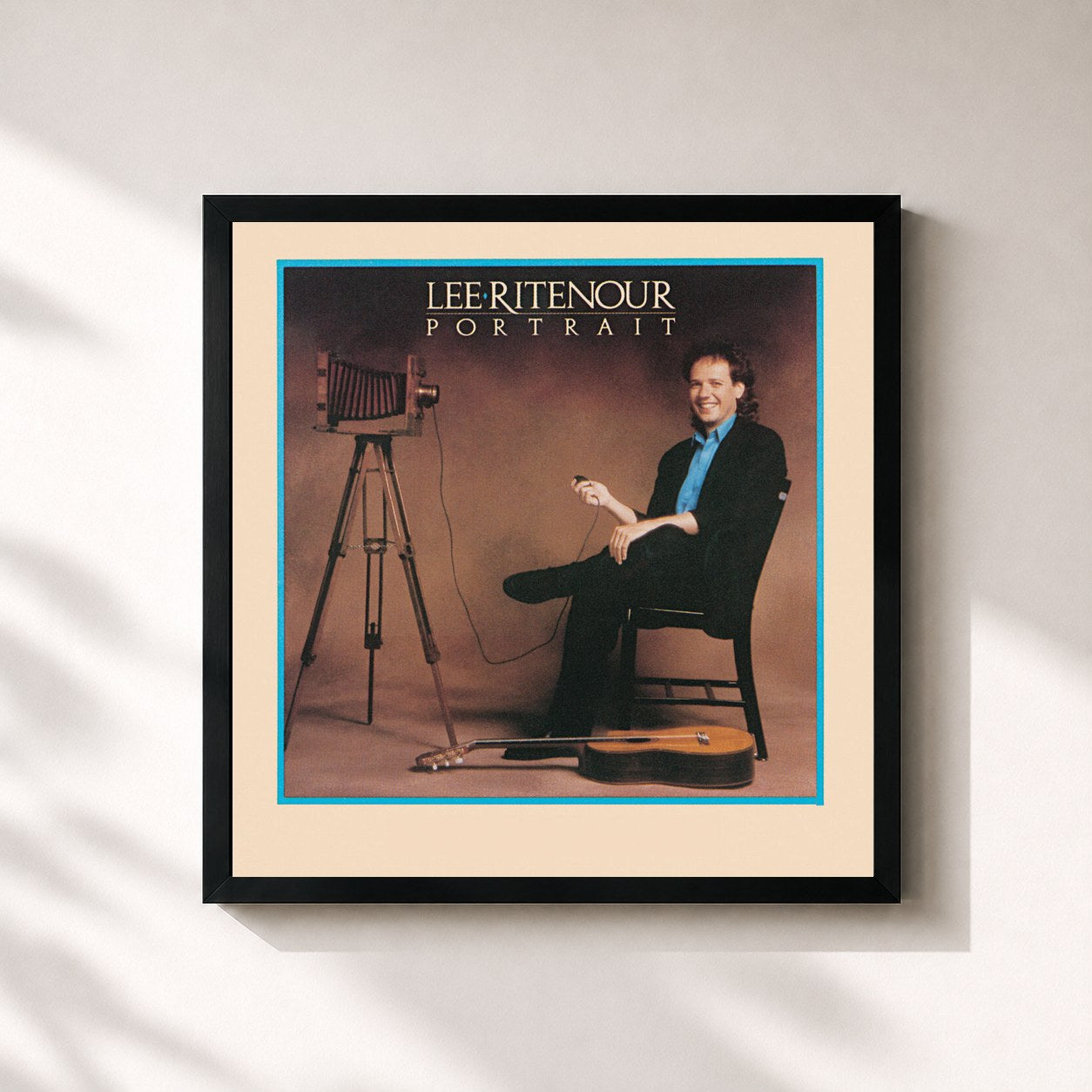 #noir Tableau carré de l'album Portrait (Remastered) de Lee Ritenour, cadre noir 32x32 cm