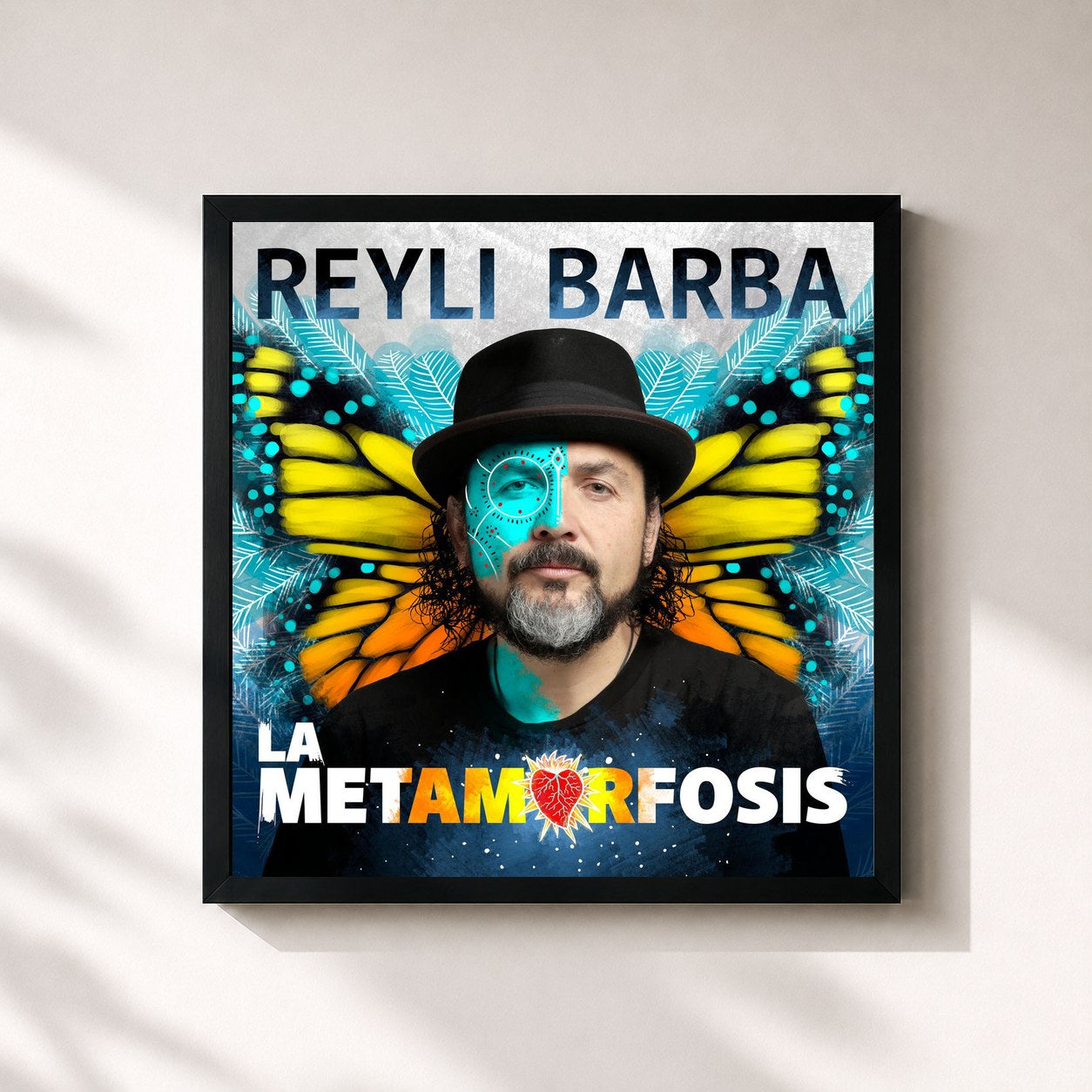 #noir Tableau carré de l'album La Metamorfosis de Reyli Barba, cadre noir 32x32 cm