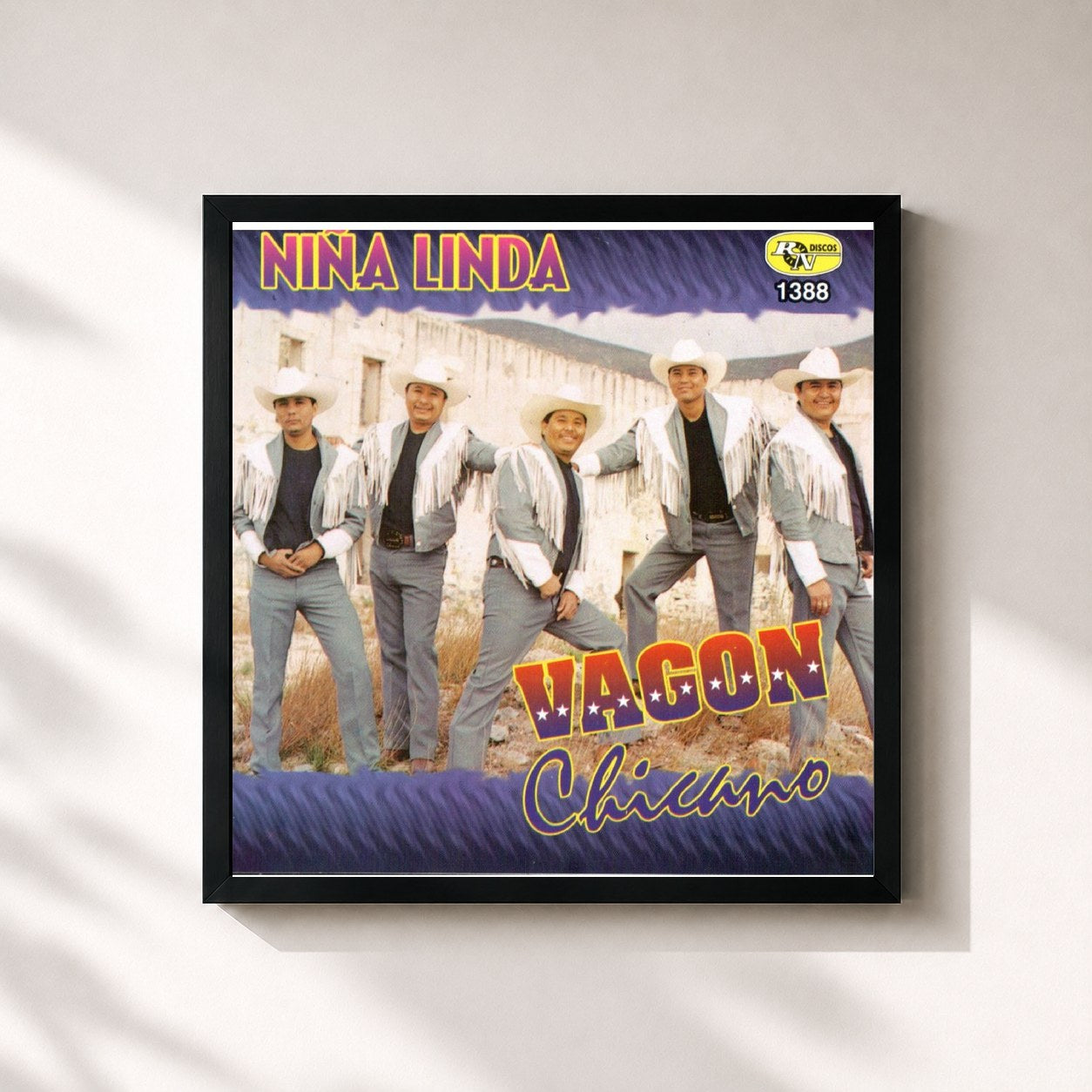 #noir Tableau carré de l'album Nina Linda de Vagon Chicano, cadre noir 32x32 cm