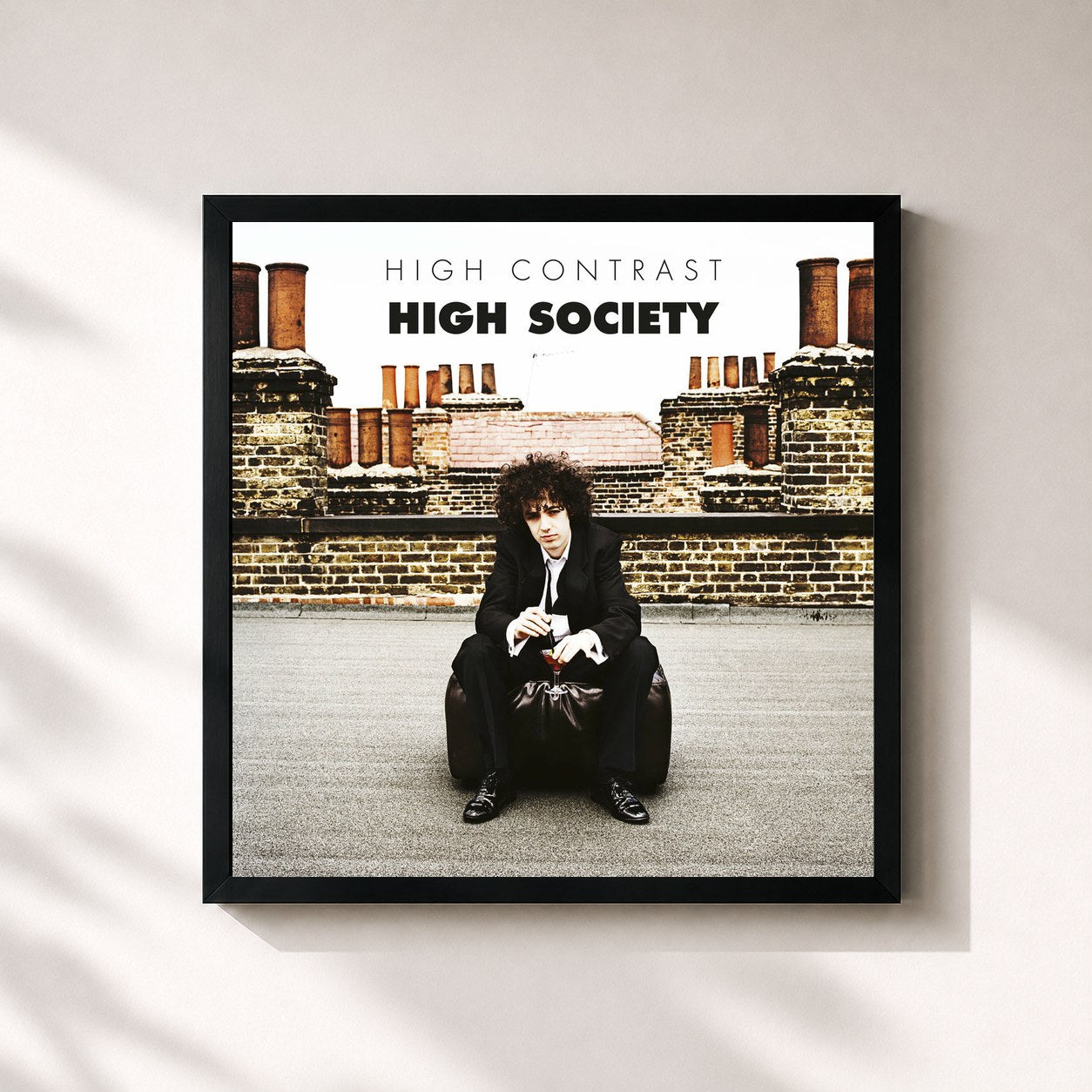 #noir Tableau carré de l'album High Society de High Contrast, cadre noir 32x32 cm