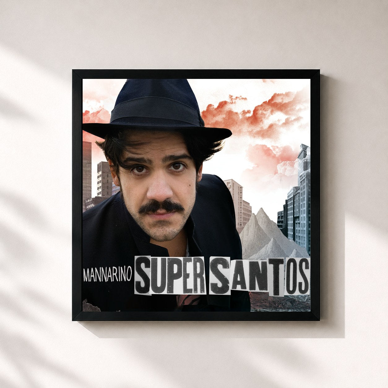 #noir Tableau carré de l'album Supersantos de Mannarino, cadre noir 32x32 cm