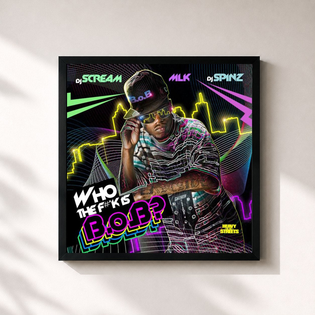 #noir Tableau carré de l'album Who The F#*ck Is B.o.B? de B.o.B, cadre noir 32x32 cm