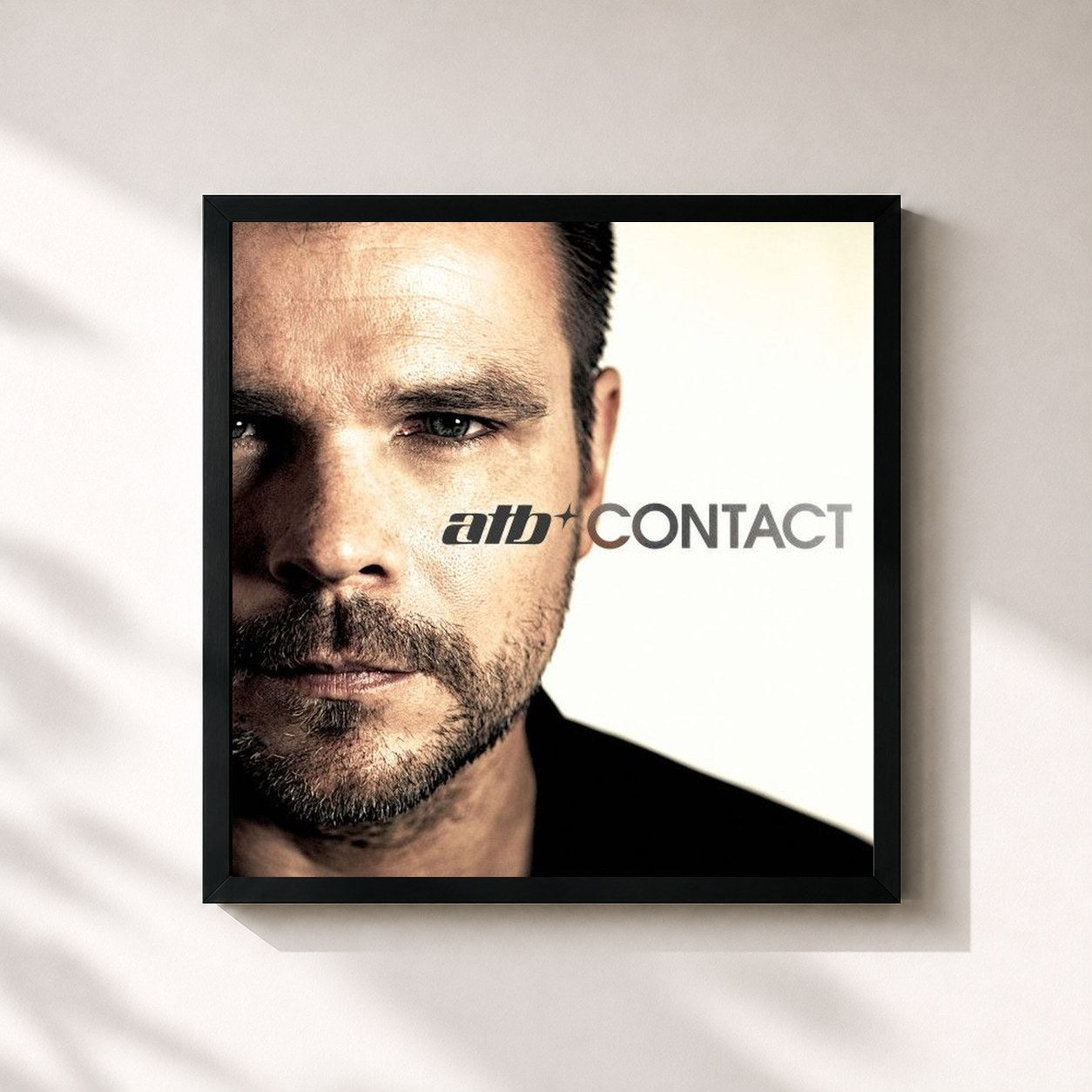 #noir Tableau carré de l'album Contact de ATB, cadre noir 32x32 cm