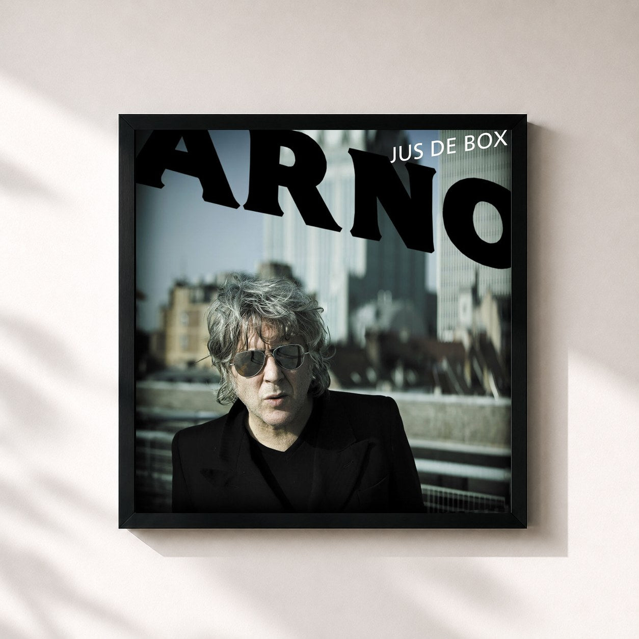 #noir Tableau carré de l'album Jus de box de Arno, cadre noir 32x32 cm
