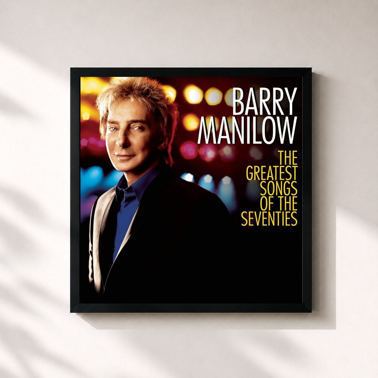 #noir Tableau carré de l'album The Greatest Songs Of The Seventies de Barry Manilow, cadre noir 32x32 cm