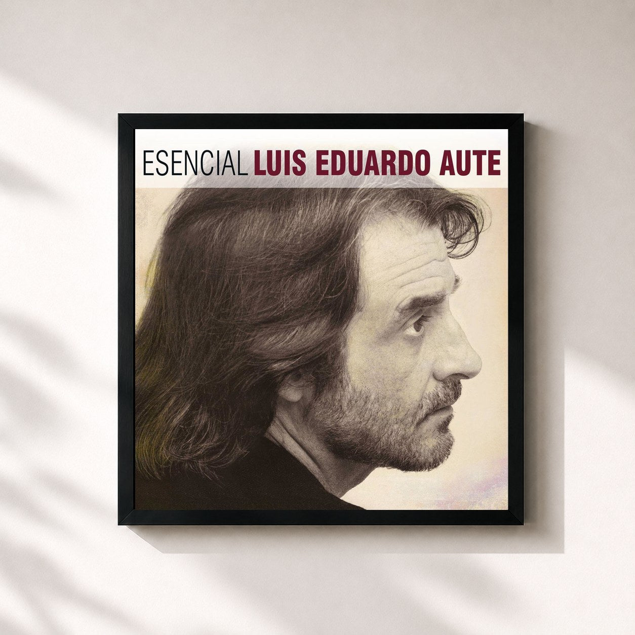 #noir Tableau carré de l'album Esencial Luis Eduardo Aute de Luis Eduardo Aute, cadre noir 32x32 cm