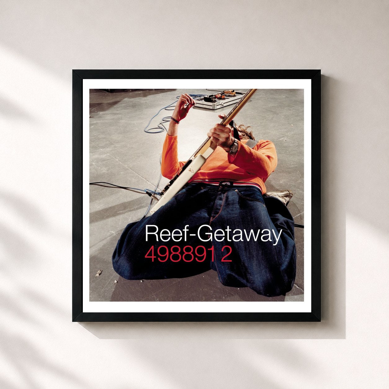 #noir Tableau carré de l'album Getaway de Reef, cadre noir 32x32 cm