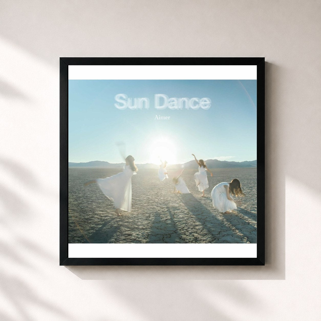 #noir Tableau carré de l'album Sun Dance de Aimer, cadre noir 32x32 cm